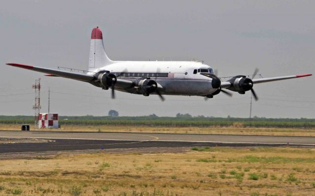 Douglas C-54 Skymaster (N460WA) - Sam practicing low-level flights in his Douglas C-54 Skymaster at Merced Regional Airport