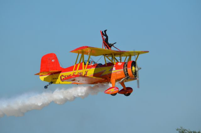 AMU7699 — - Gene Soucy and Teresa Stokes in their Grumman Showcat performing at EAA 2011.