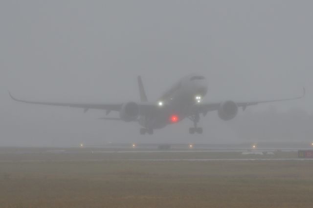 Airbus A350-900 (9V-SHN) - Adelaide, South Australia, June 16, 2020. RAIN, RAIN, RAIN - Singapore Flt 278 departing runway 05 in conditions that had changed in minutes.