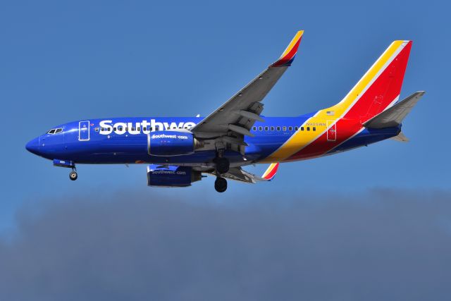 Boeing 737-700 (N925WN) - 23-L 03-16-22. Huge 1.2 million square feet Walmart Distribution Center going up in smoke west of Airport. Smoke Plume up to 15,000, and visible on satellite imagery. Smoke-Ash cloud showed up on weather radar as intense precipitation. Cause of fire unknown. Makes for cool photo's on a sunny day. Thankfully no one injured or killed.