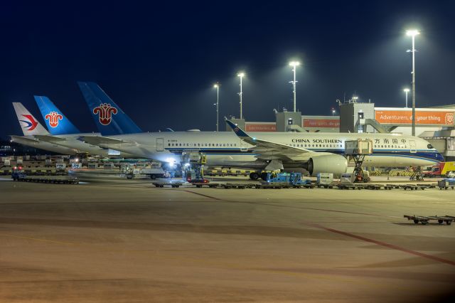 Airbus A350-900 (B-30F0) - 10th March, 2024: Flight CZ 307 from Guangzhou parked at the gate next to sistership at Schiphol Airport in Amsterdam. 