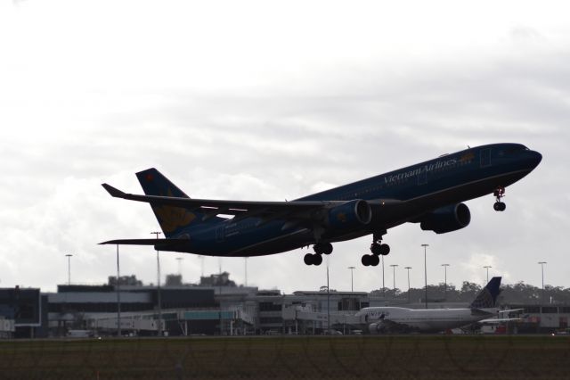Airbus A330-200 (VN-A379) - Departing runway 16 under the morning sun.