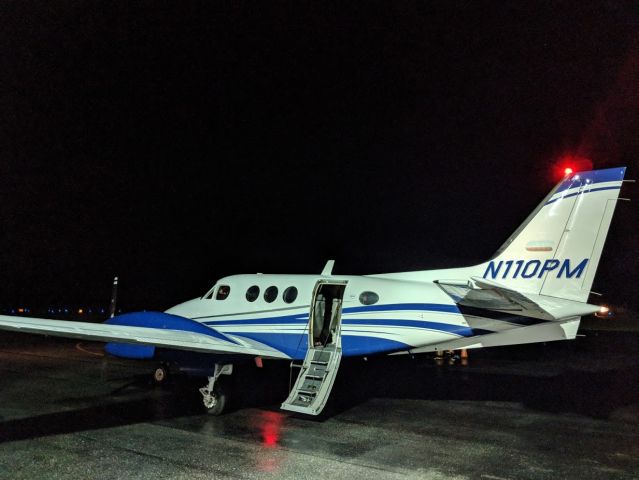 Beechcraft King Air 90 (N110PM) - Late night arrival at AVL in the rain.