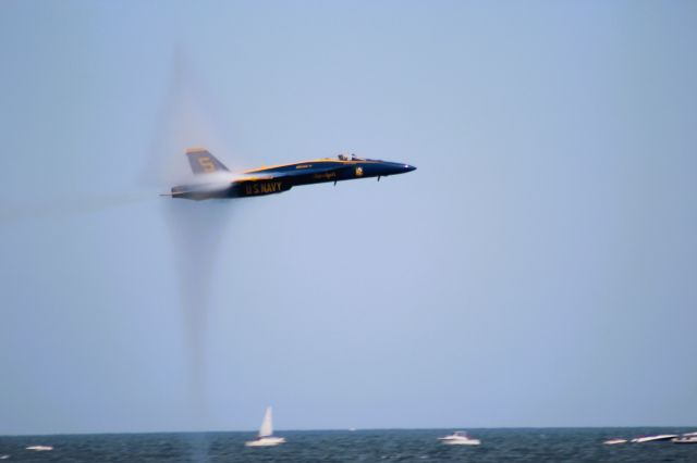 McDonnell Douglas FA-18 Hornet — - Lead Solo Blue Angel No. 5 Super Hornet, piloted by Cary Rickoff, comes in at Mach .95 for the highspeed pass. Apologize for slight blurry focusing. He gave some good vapor cones. br /br /Saturday Show along Lake Michigan Lakefront at Milwaukee.