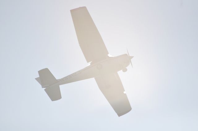 Cessna Commuter (N3312J) - I was tracking him as he crossed the sun - had I been paying attention, I wouldnt have taken the shot.