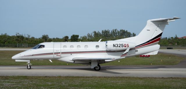 Embraer Phenom 300 (N325QS) - Taxing to runway 5