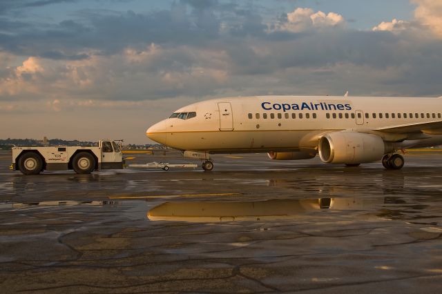 Boeing 737-700 (HP-1379CMP) - July 16th after heavy rain on the way to North Cargo !