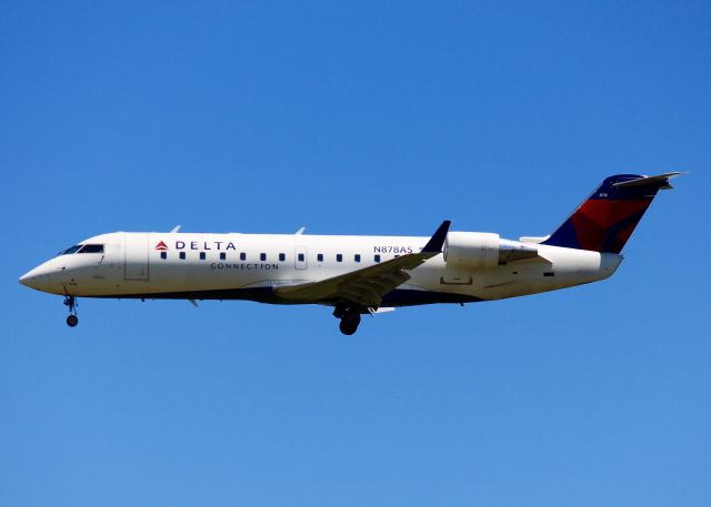 Canadair Regional Jet CRJ-200 (N878AS) - At Shreveport Regional.