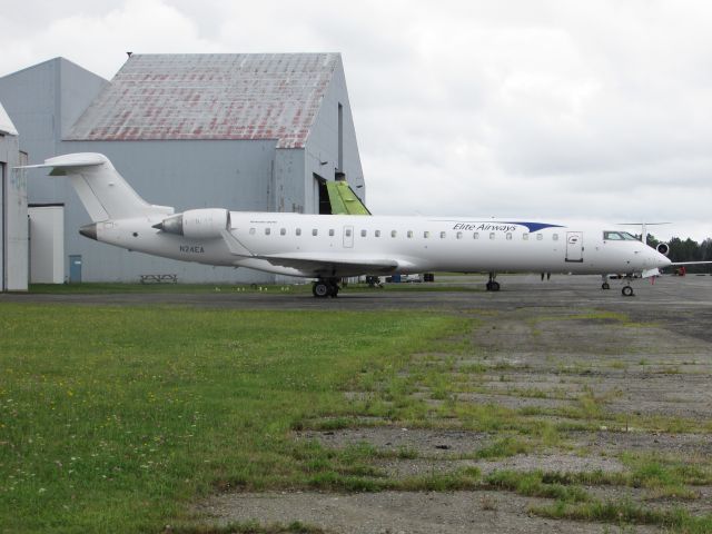 Canadair Regional Jet CRJ-700 (N24EA) - This aircraft and its sister ship in BGR for maintenance.