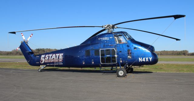 Sikorsky S-58T (N4XY) - A 1957 model Sikorsky S-58T, owned by 5 State Helicopters, tied down on the ramp at Pryor Field Regional Airport, Decatur, AL - very late in the afternoon, April 2, 2022.