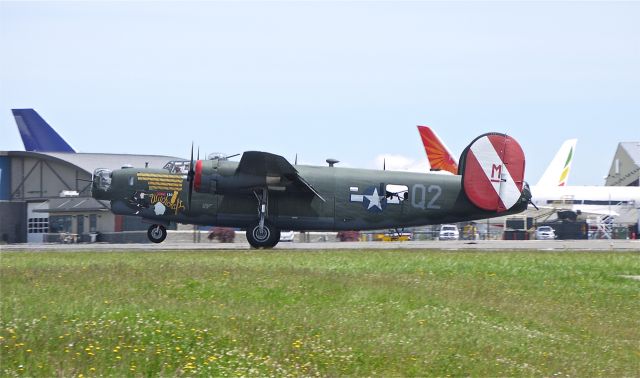 Consolidated B-24 Liberator (N224J) - Collings Foundations B-24J Liberator (Ser#44-44052) landing on runway 34L, 6/15/12.