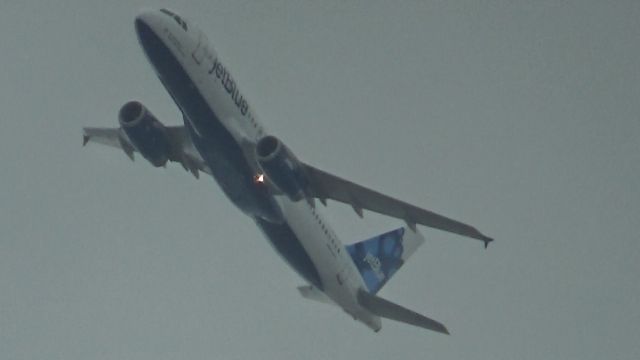 Airbus A320 (N703JB) - "Its up to Blue, New York New York" is climbing away from Long Beach Airport bound for San Fransisco