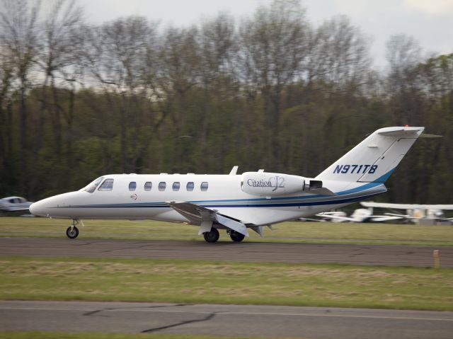 Cessna Citation CJ3 (N971TB) - Landing runway 26. Ground flaps deployed.