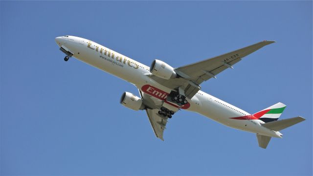 BOEING 777-300 (A6-EGS) - UAE777 climbs after departing runway 34L for the delivery flight to Dubai Intl (OMDB / DXB) on 6/11/12.