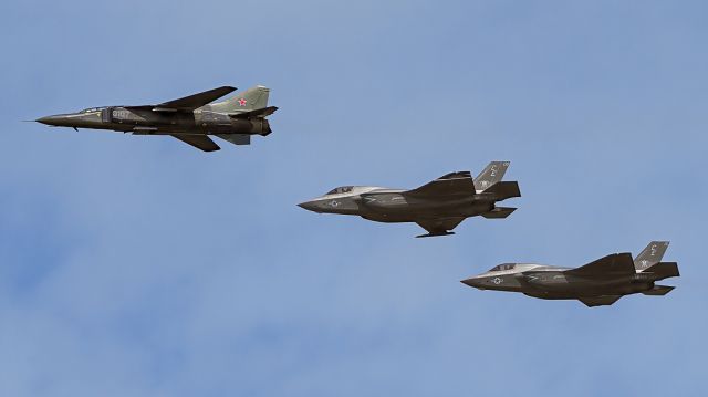 MIKOYAN MiG-27 Bahadur — - MIG-23UB with 2 USMC F-35B from VMFA-225 MCAS Yuma at Thunder Over Michigan 2023, Willow Run Airport.