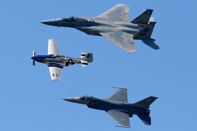 Lockheed F-16 Fighting Falcon (88-0521) - Heritage Flight at Cleveland National Air Show on 1 Sep 2008. The Pilots and crew of the North American P-51D Mustang (Excalibur/ N151W), USAF Lockheed Martin F-16C Fighting Falcon (88-0521), and USAF McDonnell Douglas F-15C Eagle (82-0021) put on a brilliant display of USAF history each day throughout the weekend.