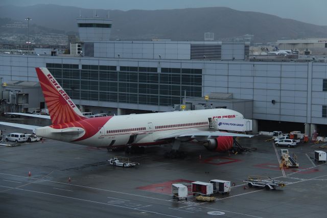 BOEING 777-200LR (VT-ALF) - KSFO - Air India 777 being readied for the next flight shown docked at the International Terminal Nov 10th, 2017, I have photos of -ALF at Boeing Everett taken back in the mid 2000s minus engines - now seen here, the 2nd time Ive seen this jet.