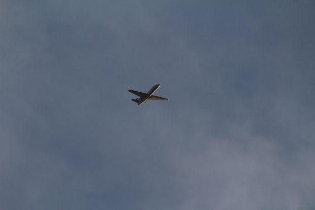 — — - Small airplane, flies above Nieuwkoop and going to land on Aalsmeerbaan at Schiphol Amsterdam Airport (Holland).