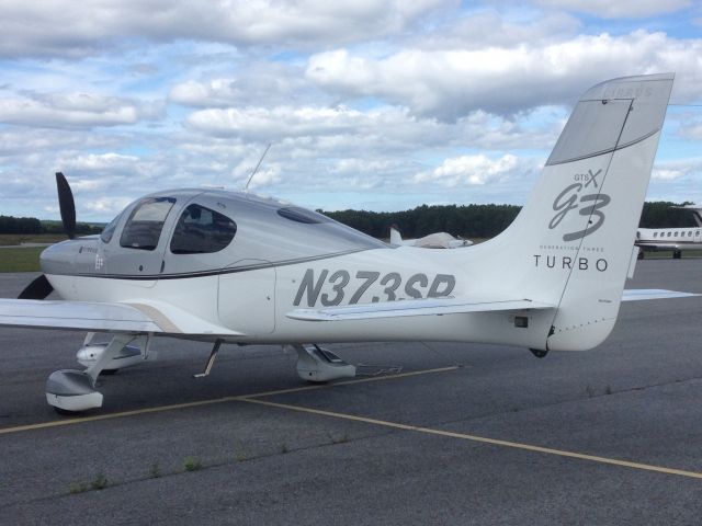 Cirrus SR-22 (N373SP) - Brilliant and beautiful shot of this Cirrus SR22 GTS-X-  Generation 3 turbo, at Saratoga County Airport. (5B2)