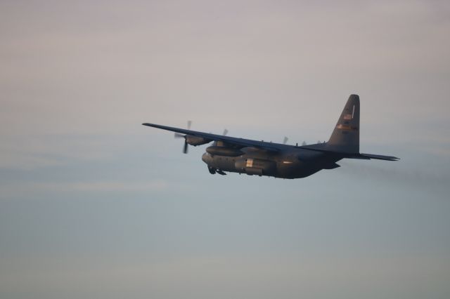 Lockheed C-130 Hercules (61007) - Following 61003 on a sunset takeoff