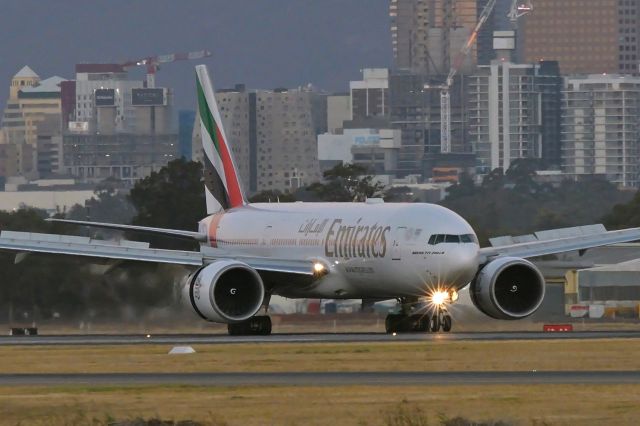 BOEING 777-300ER (A6-EWC) - Adelaide, South Australia, January 6, 2020. With everything hanging out and thrust reversers deployed this Triple 7 will easily be slow enough to turn off at taxiway F5, well short of the end of the runway.