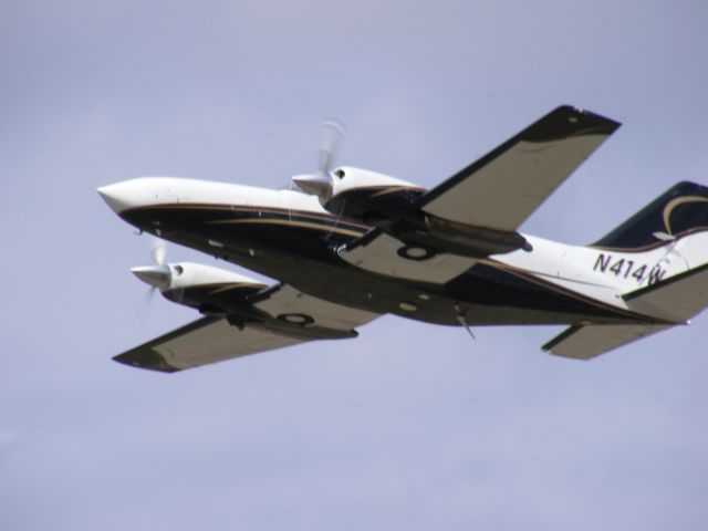 Cessna Chancellor (N414WJ) - N414WJ Departing 26 Andrews.  02/27/2011