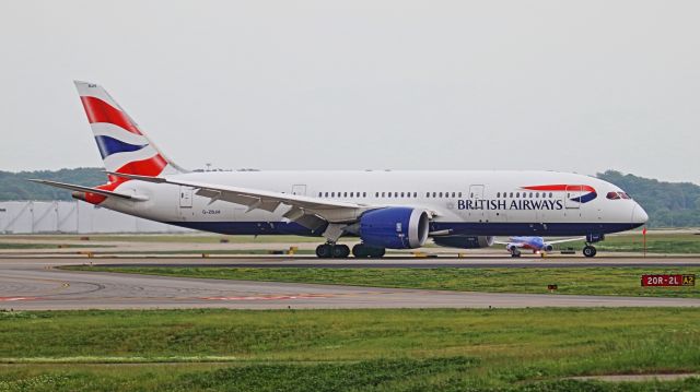 Boeing 787-8 (G-ZBJH) - 1st British Airways flight 223 arriving in Nashville, Tennessee on runway 20R.  Photos were taken from the Airport Observation Area on Vultee Boulevard in poor lighting.