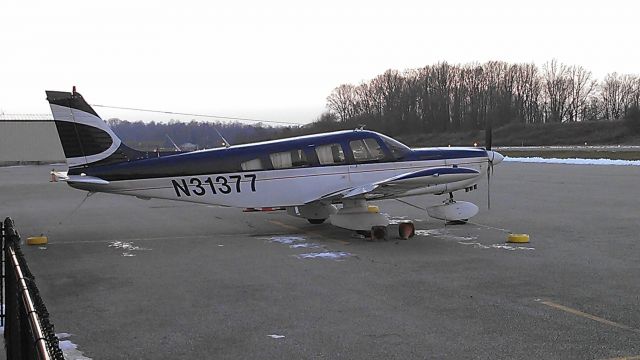 Piper Saratoga (N31377) - Parked in front of the FBO at Brandywine Airport on Jan. 4, 2013.