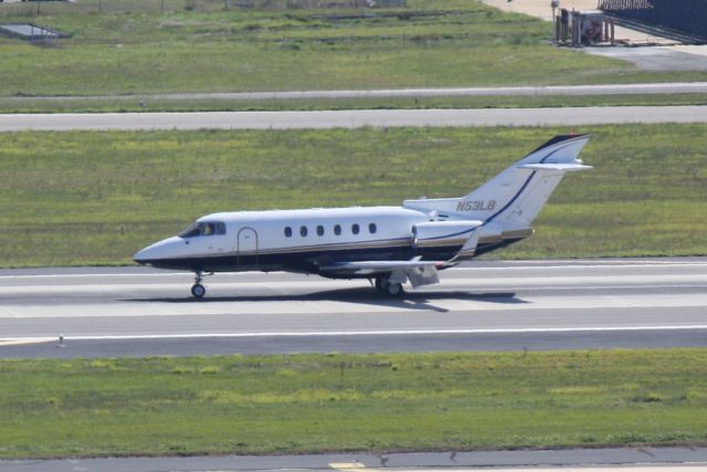 Hawker 800 (N53LB) - N53LB arrives on Runway 1R at Tampa International Airport following a flight from Spirit of St. Louis Airport