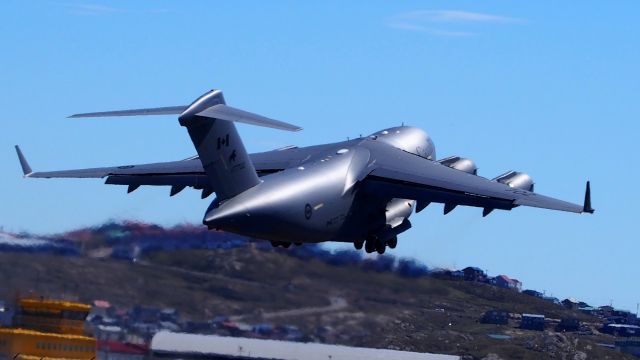 17-7702 — - The Globemaster III, 177702, leaving Iqaluit on June 30, 2016.