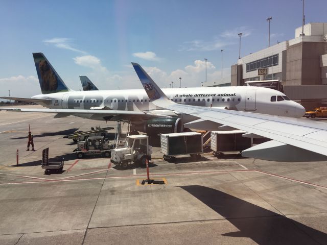 Airbus A321 — - The plane the picture was taken from was a Frontier flight to Cincinnati/Northern Kentucky (CVG) on the afternoon of June 28, 2016.br /The Frontier plane in the background (N211FR) is an A320 boarding for a flight to Seattle-Tacoma.