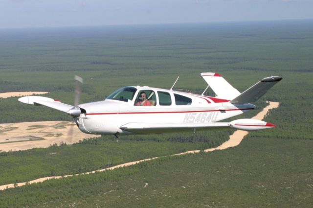 Beechcraft 35 Bonanza (N5464U) - Over central Florida.  On the way for another $100 hamburger.