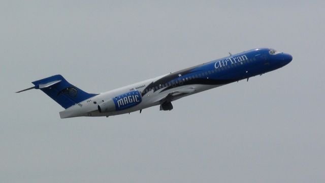 Boeing 717-200 (N949AT) - an Airtran 717 in the Orlando magic livery is seen here taking of on runway 22R at Boston Logan Airport KBOS.