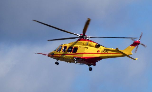 BELL-AGUSTA AB-139 (I-FIPS) - Shortly after departure is this 2004 Italian Republic AgustaWestland AW139 rotorcraft in the Autumn of 2019.