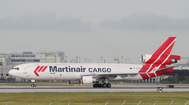 — — - Martinair MD-11 after landing on KMIAs runway 27.