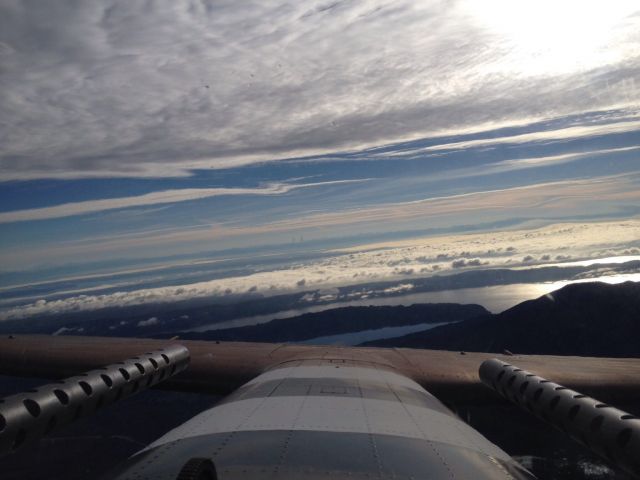 North American TB-25 Mitchell — - Out over Puget Sound heading West toward Olympic National Park, looking out East from the upper turret position.