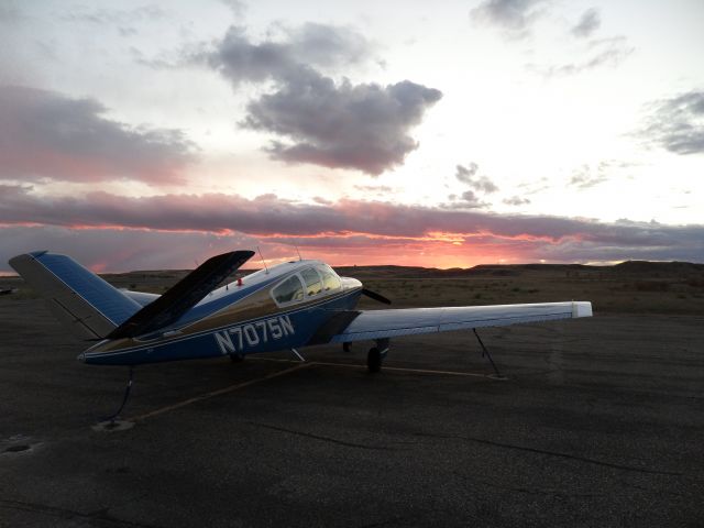 Beechcraft 35 Bonanza (N7075N) - V-Tail at sunset