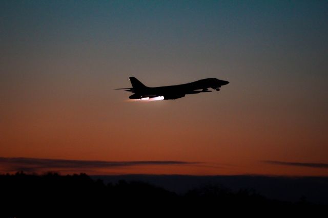 — — - Rockwell B-1 Lancer departing Bangor International Airport.