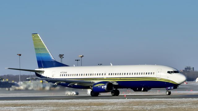 BOEING 737-400 (N752MA) - Taking off to Pittsburgh (PIT/KPIT) after dropping off the Montreal Canadians hockey team,