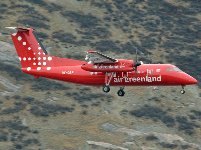 de Havilland Dash 8-200 (OY-GRP) - Just behind the fence