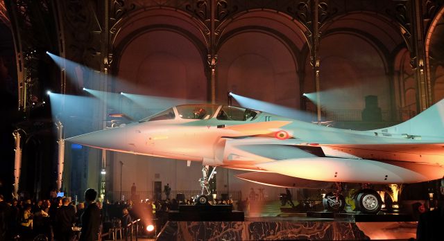 — — - Dassault Rafael in Grand Palais, Paris to mark occasion of 100th Anniversary of the start of Dassault Aviation. The Grand Palais was the site of the worlds first Air Show in 1909