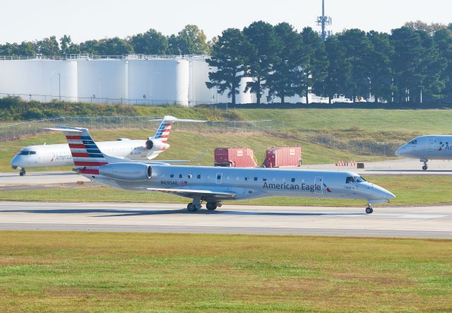 N695AE — - Starting their take-off roll on Rwy 18C