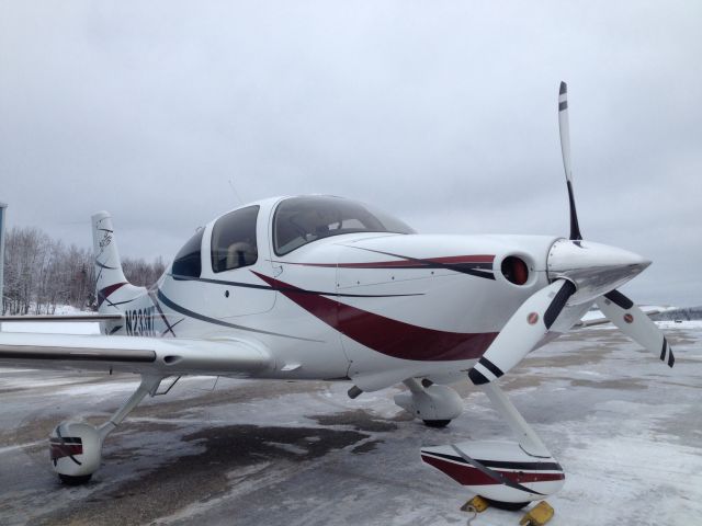 Cirrus SR-22 (N233WZ) - On the deck @ KSLK after graphics  work.