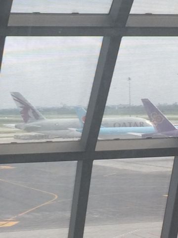 Airbus A380-800 — - New Qatar A380-800 parked at Bangkok airport as seen from my vantage point pretty far away.