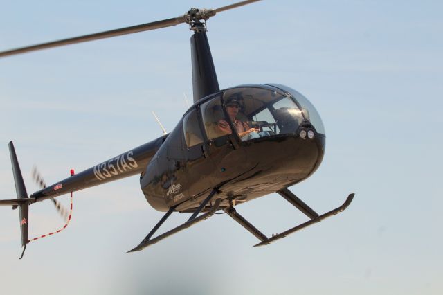 Robinson R-44 (N357AS) - KRDD - Air Shasta Robinson 44 Helicopter setting down at the Air Shasta ramp 7/2/2016. I think this is a fairly new R-44 for Air Shasta. From the fence where I was, touch down and rotor spin was 20ft away! So cool, I had not been in a rotor wash like that since I ....cannot remember! click full.