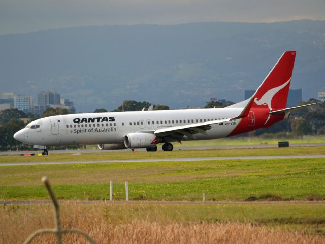 Boeing 737-800 (VH-VXR) - On taxi-way heading for Terminal 1 after landing on runway 23. Wednesday 4th July 2012.