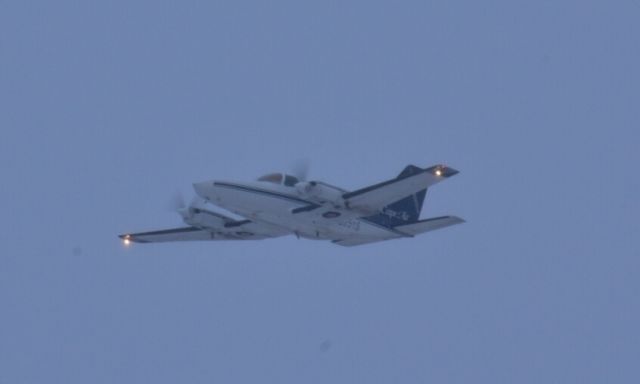 Cessna 402 (N2651S) - A Cape Air Cessna 402C departing for a flight to KSTL on a cold snowy morning