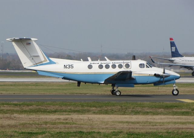 Beechcraft Super King Air 200 (N35) - FAA King Air 200 on taxiway Sierra heading to 27R to depart