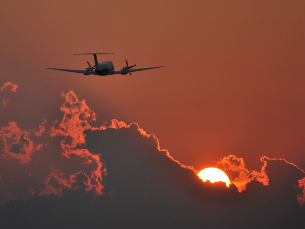 Beechcraft Super King Air 200 (N988WC) - Was registered to PRUITT TRAN INC (N257YA) at the time picture was taken, departing runway 31 into the sunset at KCUB. - 6/23/10 ***** NOW REGISTERED to E S WAGNER CO as N988WC