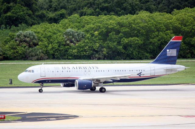 Airbus A320 (N109UW) - US Air Flight 768 (N109UW) departs Runway 19R at Tampa International Airport enroute to Philadelphia International Airport